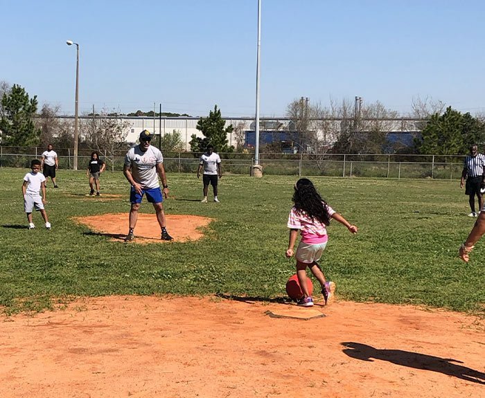 Coach working with a young player