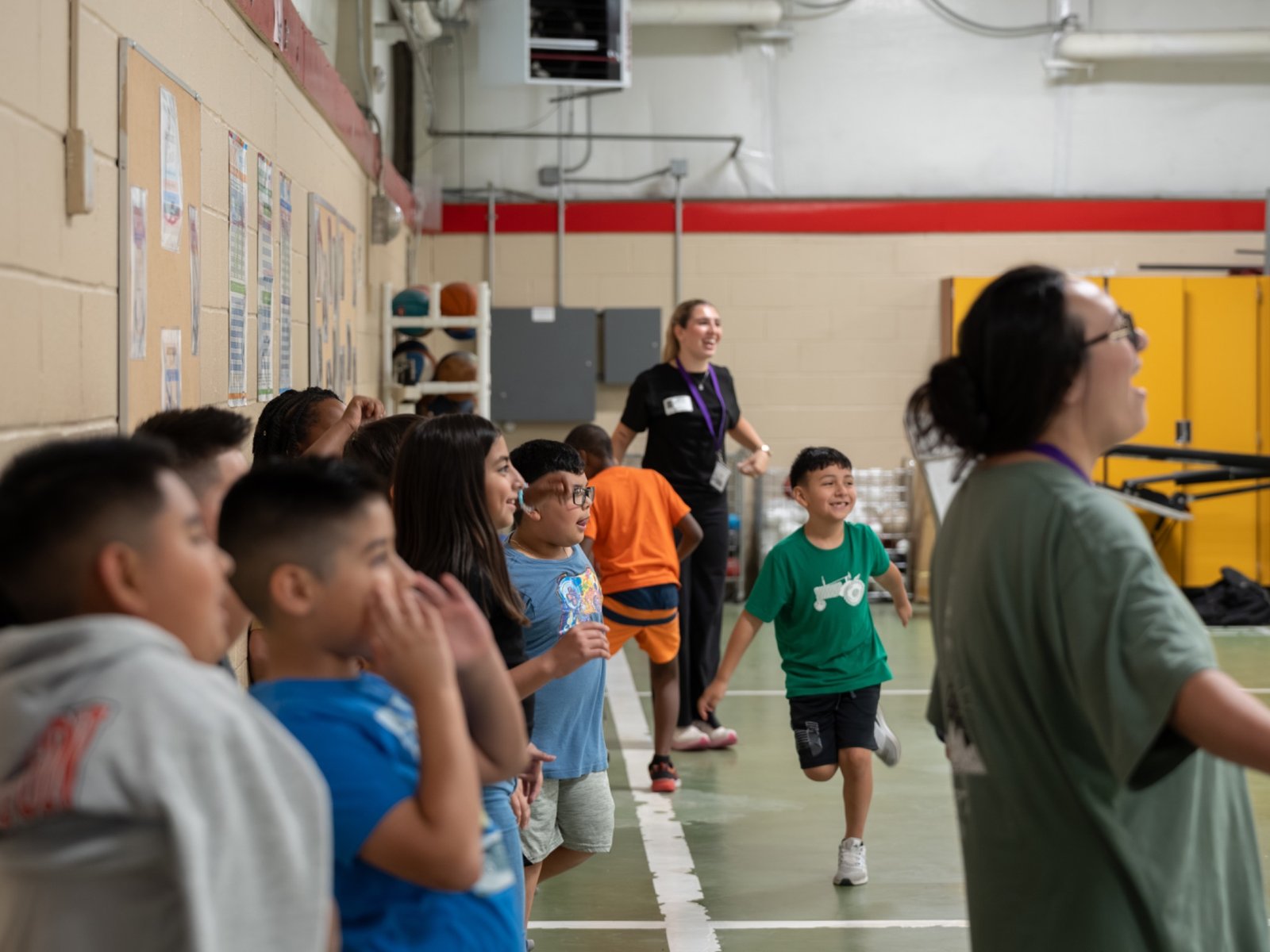 Youth cheering each other on during a YES Community Program activity